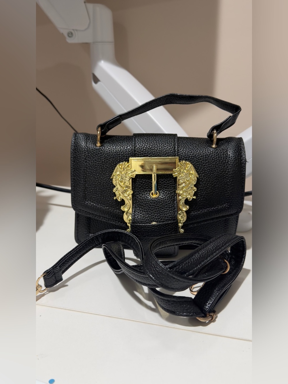 Black Leather Crossbody Bag with Gold Filigree Buckle
